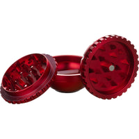 Disassembled Grinder by Cheech Glass in red showing grinding teeth, mesh screen, and kief catcher compartment